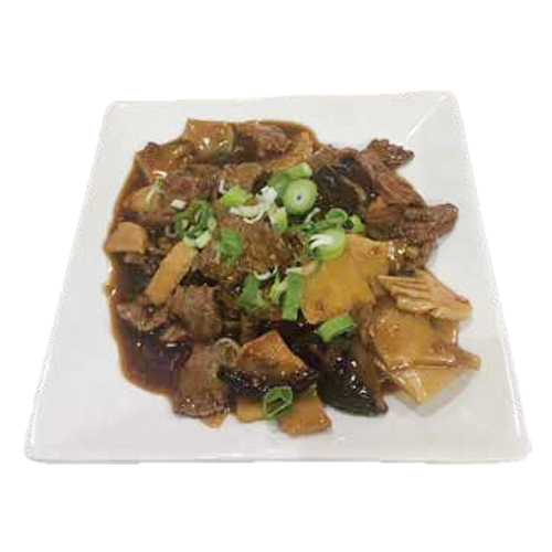 Ternera con bambú y setas